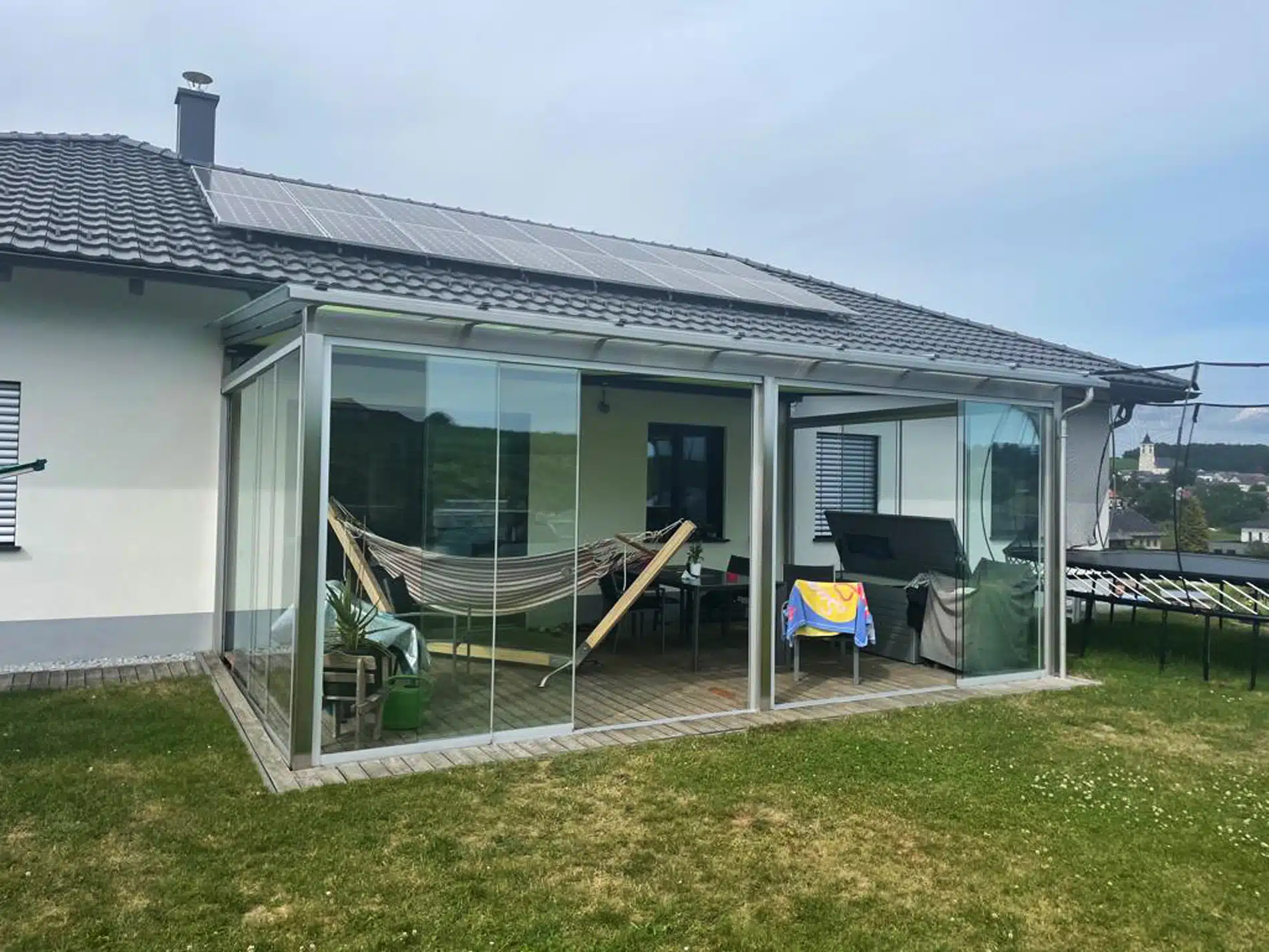 Edelstahl Terrassenüberdachung zu Sommergarten umbauen