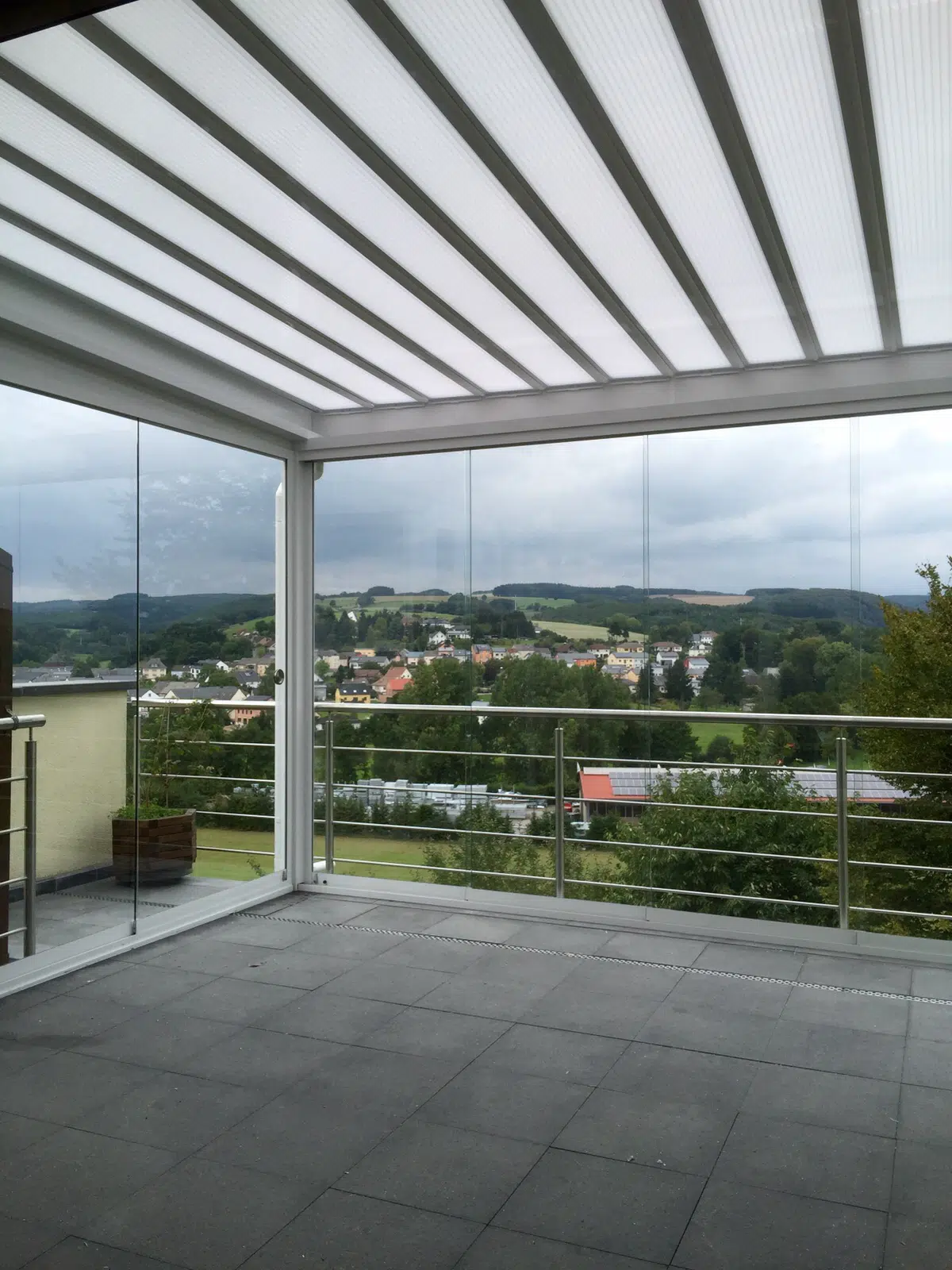 Glasschiebetüren für bestehende Terrassenüberdachung