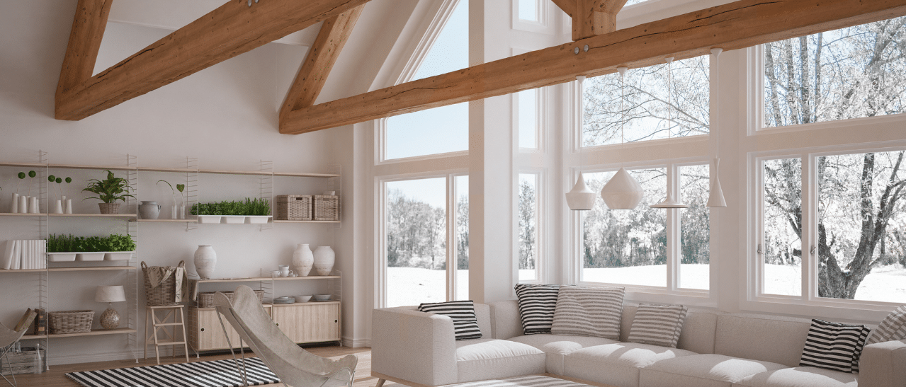 Modern eingerichteter Wohnraum mit Panoramafenster, Gardinen für Gemütlichkeit, Jalousien, Rollläden und Plissees für optimalen Schutz.
