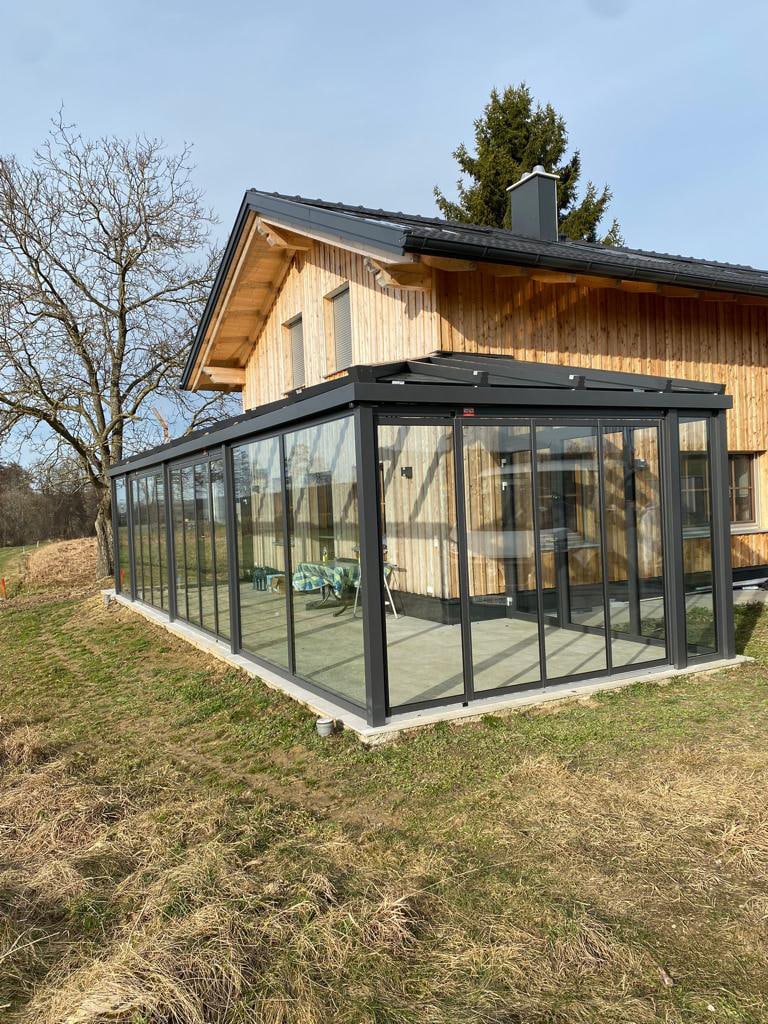 Großer Wintergarten in DB 703 mit Schiebe-Dreh-Türen