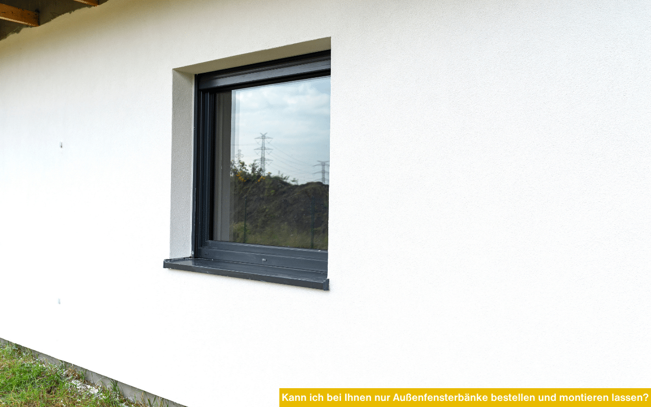 Kann ich bei Ihnen nur Außenfensterbänke bestellen und montieren lassen? Detailansicht einer dunklen Alu-Fensterbank.