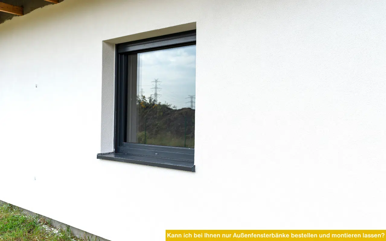 Kann ich bei Ihnen nur Außenfensterbänke bestellen und montieren lassen? Detailansicht einer dunklen Alu-Fensterbank.