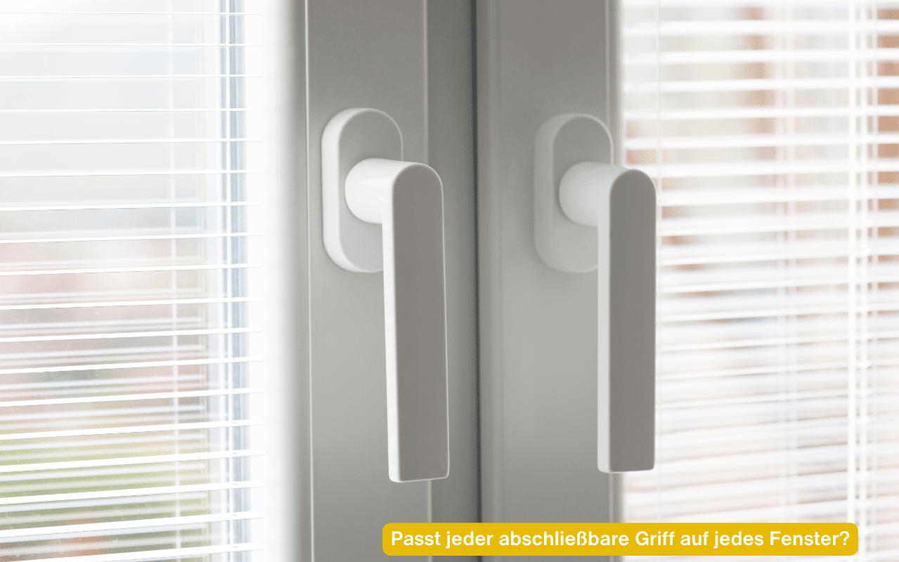 Passt jeder abschließbare Griff auf jedes Fenster? Zwei weiße Fenstergriffe an einem Doppelfenster
