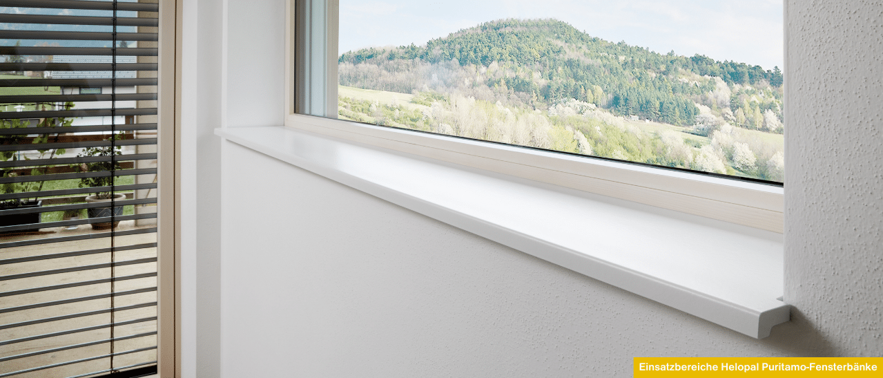 Puritamo Fensterbank im Innenbereich bei Holzfenster als Beispiel für stilvolle und funktionale Helopal-Fensterlösungen.