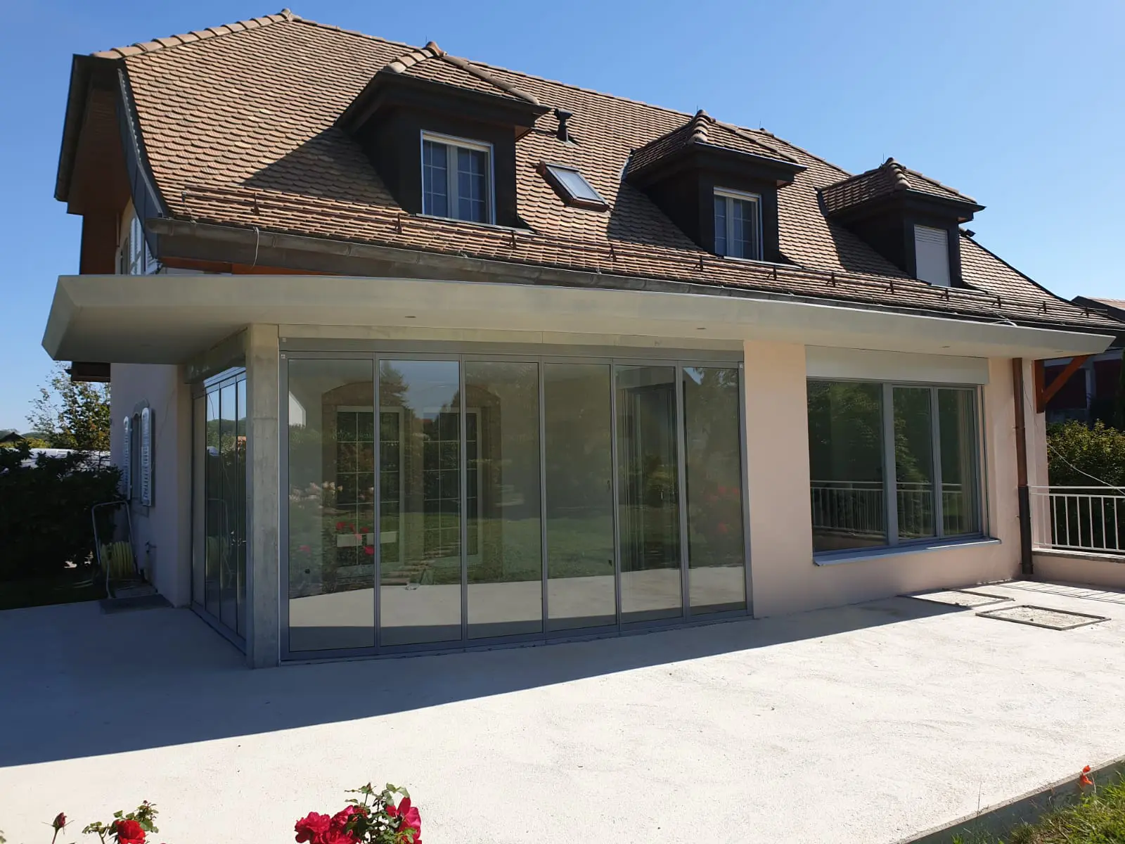 Schiebe-Dreh-Konstruktion als Terrassenverglasung