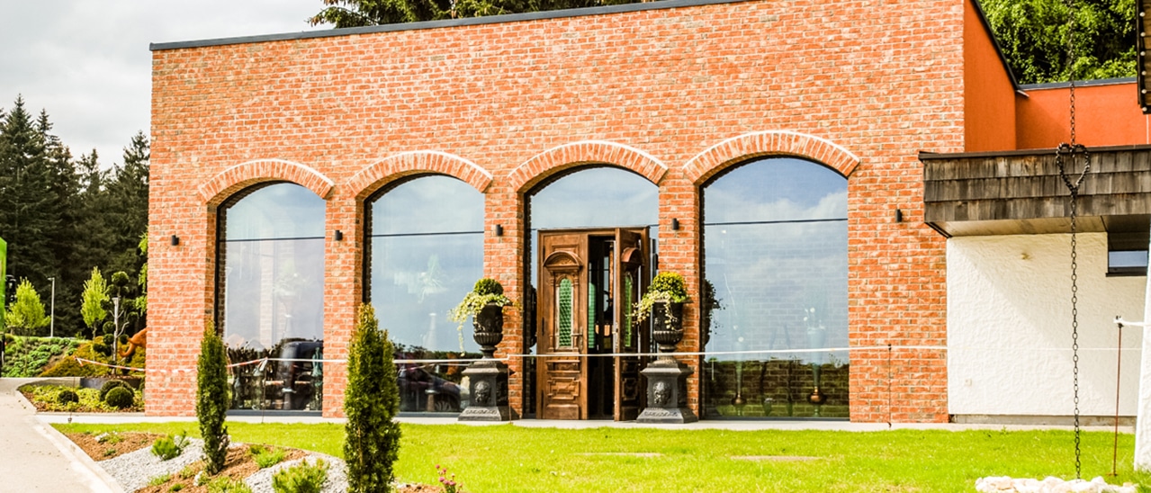 Segmentbogenfenster Referenz Aviva Brauboutique