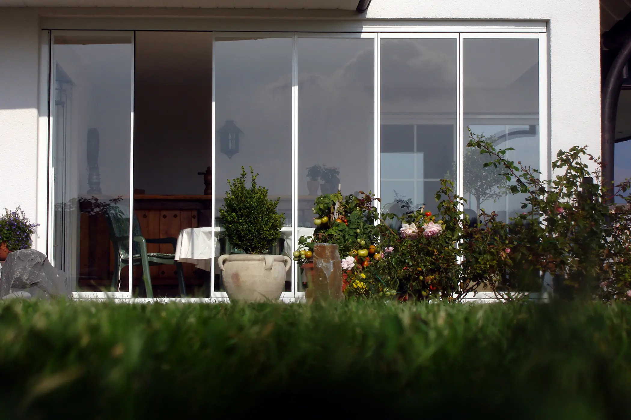 Terrasse mit Glas schützen