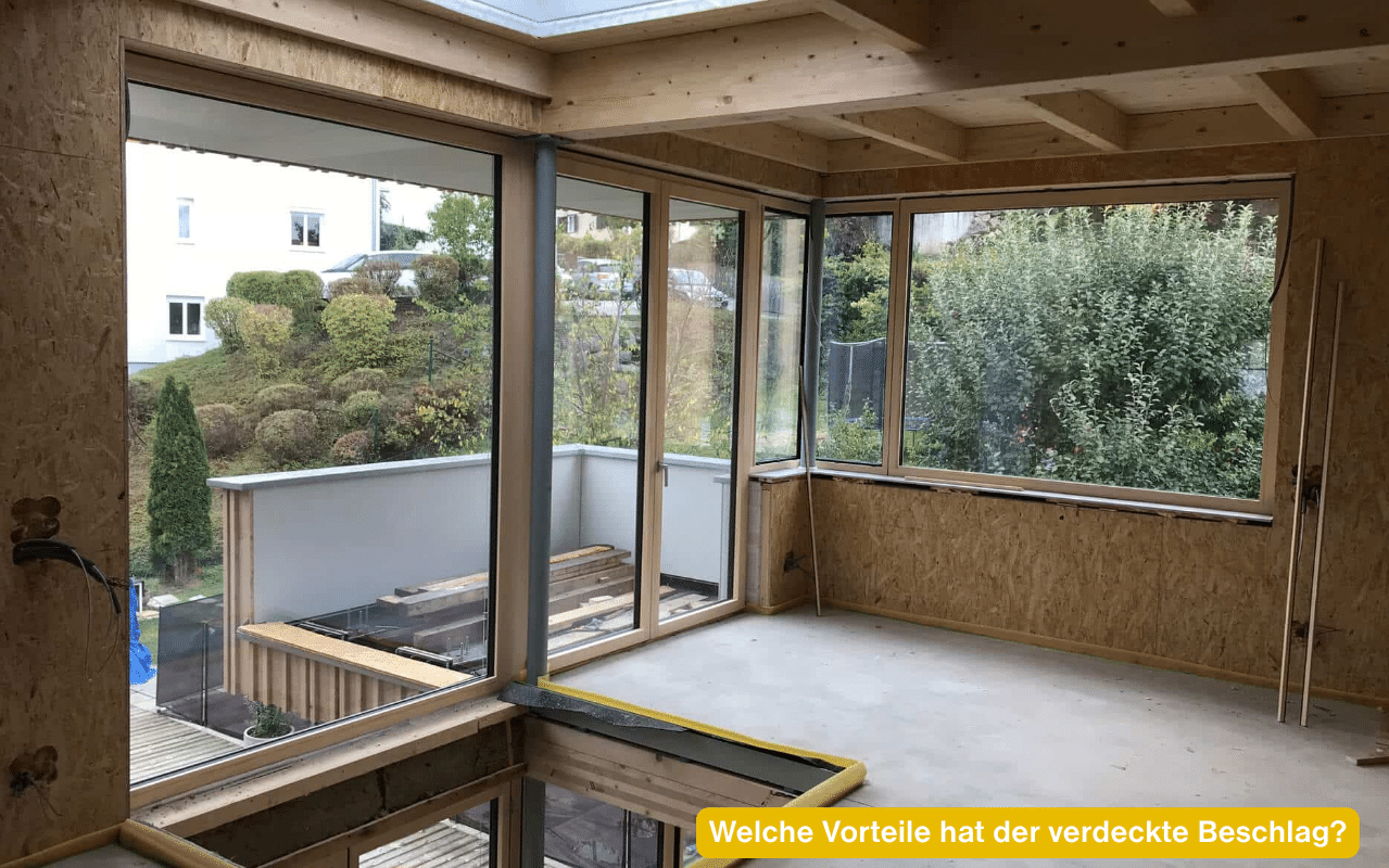 Welche Vorteile hat der verdeckte Beschlag? Holz-Alu-Eckverglasung von innen mit großen Flügeln
