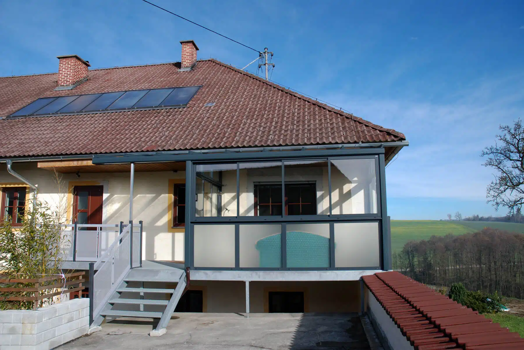 Wintergarten an bestehendes Haus angebaut