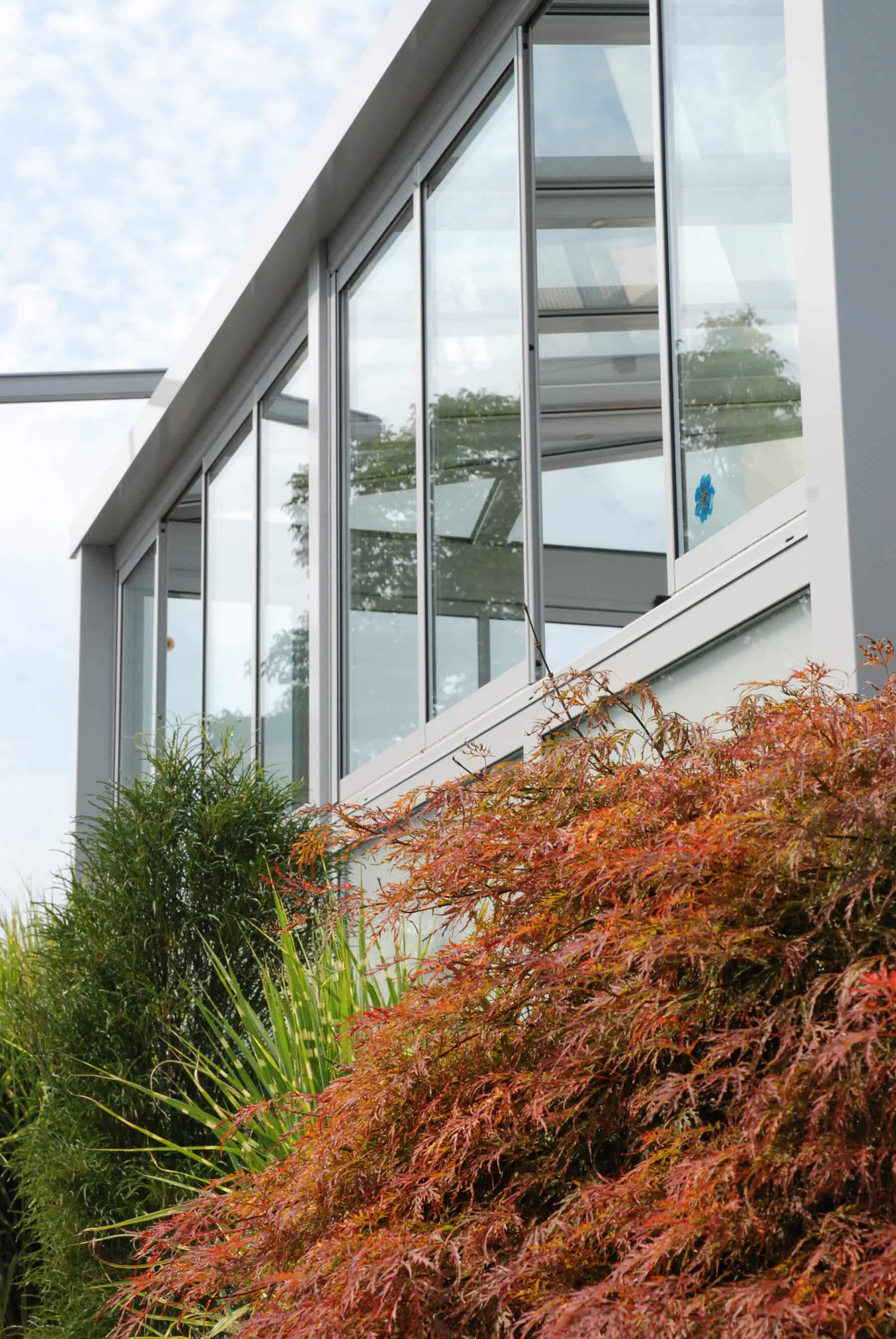 Wintergarten mit Sunflex Faltfenster